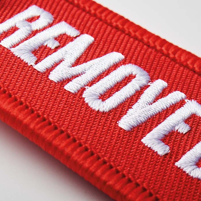 broderade nyckelringar i egen design