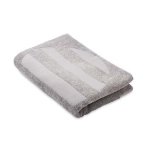 Strandhandduk med vävd relief
