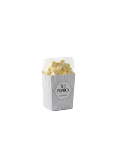 Popcornbägare Liten med färdigpoppade popcorn